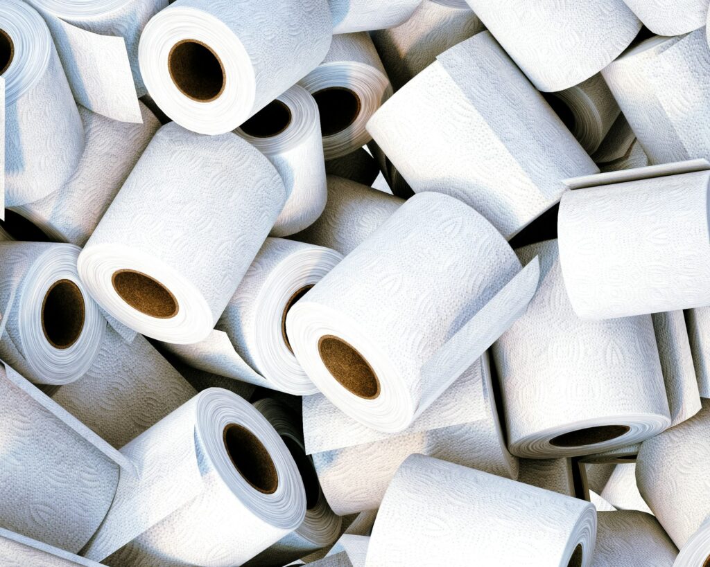 Toilet paper rolls in a pile